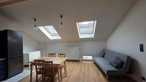 Anthracite Apartment on Felicjanek Street by CityBeat