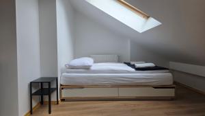 Anthracite Apartment on Felicjanek Street by CityBeat