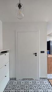 Anthracite Apartment on Felicjanek Street by CityBeat