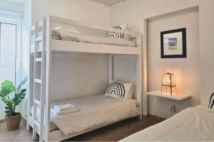 Beach House on Faro Island with a Dreamy Terrace and 7 Beds for the Perfect Escape