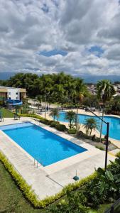 Apartamento a 5min del Aeropuerto - 20min Parqué del Café - Con 3 Piscinas - 2 Jacuzzi - Sauna - By Molca Travel