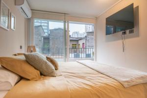 HOM I Exclusivo Dpto 1D1B 3PAX Santiago Centro