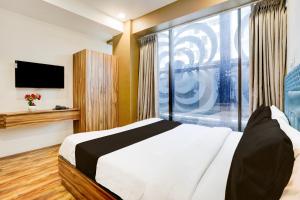 Super Collection O Vesu Surat Formerly Hotel Signature - 3-star hotels in Surat