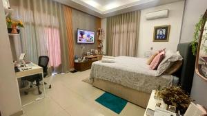 No centro com segurança e lazer para 13 pessoas