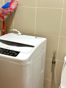 Cairong Inn Condominium TV with Netflix FAME RESIDENCES