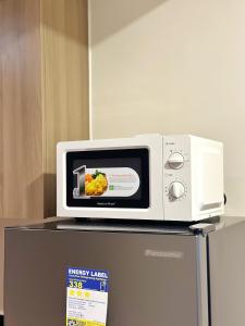 Cairong Inn Condominium TV with Netflix FAME RESIDENCES