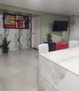 Habitación en apartamento compartido frente a Maiquetía!