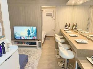 Royce Staycation - Trees Residences Cozy unit with PS4