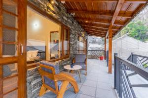 SaffronStays Kurmavana, Bhimtal - luxury cottage with pool and lawn -clear roads