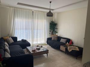 Chic 2BR Getaway with Large Balcony and Central AC