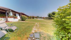 Harmonia Cottage by Bookinggardalake