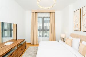 Escape24 Elegant 1BR with Sea View & Beach Access in La Mer