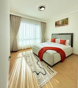 Elegant classy apartment with modern equipped with swimming pool gym, private parking space and proximity to major shopping malls