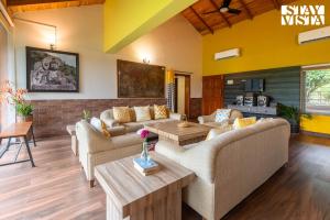 StayVista at Starlight Springs with Pool, Lawn