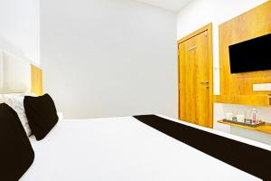 Collection O Adajan Formerly Hotel Western Inn