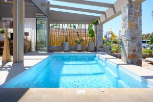 Sabbia Mare BeachFront Villa, steps from Dining & Shops, By ThinkVilla