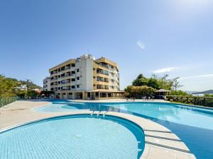 C118 Apartamento de 1 quarto em condomínio pé na areia