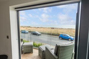 Rise and Shine - With a Balcony On the Seafront