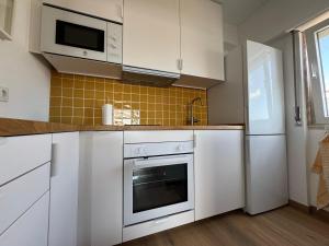 WHome Seaside Getaway Beachfront Apartment