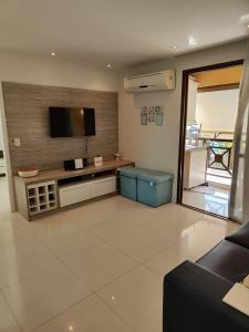 Apartamento com vista para piscina em Angra dos Reis - Condomínio com piscina, bar molhado e marina - Aluguel de Lancha no Local