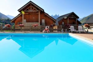 Appart'hotels Goelia - Les Chalets des Marmottes : photos des chambres