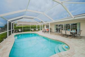 Villa Frances - Beautiful electric-heated pool home on Sailboat Access Canal - SWFL Rentals