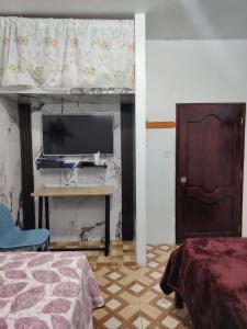 Cuarto en galápagos