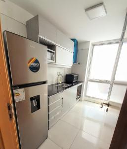 Apto 210 Un Refugio luminoso frente a la playa