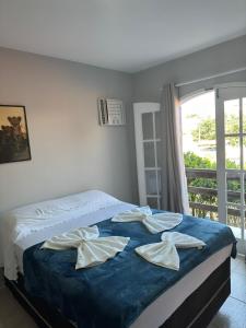 POUSADA e HOSTEL ARAUNA