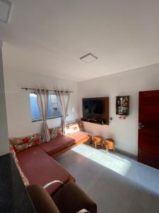 Casa de praia com piscina, churrasqueira, com 2 vagas de garagem