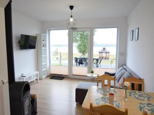 Cottage by Kiedrowickie Lake with Boat Access