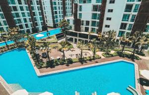 Chiang Mai the one C6 Vacation Apartment Super Value with swimming pool landscape Cooking Allowed