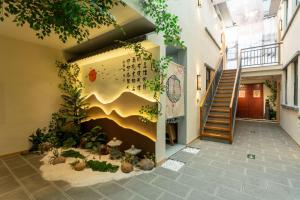 Floral Hotel Dongmoshang B&B, Lijingmen Cross Street, Luoyi Ancient City