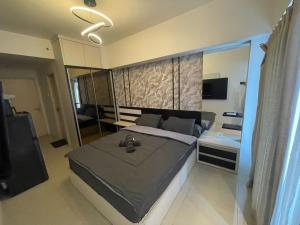 Studio Orchard Apartment Pakuwon Mall by ASH with wifi, Netflix, water heater