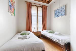 Duplex Atypique 3 chambres au coeur du Marais