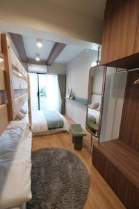 The Shantipan Lotus - Cozy 2BR Family Stay 400m from BTS Station