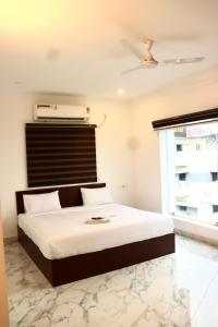 Hotel Rhythms Chennai near TradeCentre,Miot,DLF,L&T