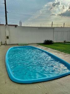 Casa com churrasqueira e piscina