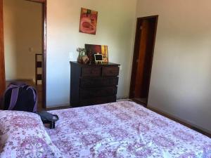 Casa com churrasqueira, varanda e uma brisa especial