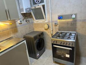 Cozy 2-Bedroom Apartment with Garden & AC, Madinaty