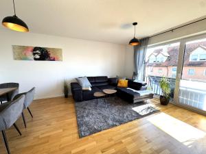 Gehobenes Wohnen mit Balkon, Parkplatz und keine 10 Minuten in die City