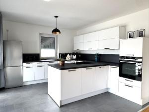 Gehobenes Wohnen mit Balkon, Parkplatz und keine 10 Minuten in die City