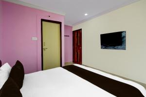 Hotel O Madhu Grand Luxury Rooms