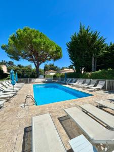 Grand studio climatisé, piscine, plage 5mn, parking gratuit