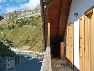 LA PULCE INNEVATA - mansarda sulle piste, Dolomiti Affitti