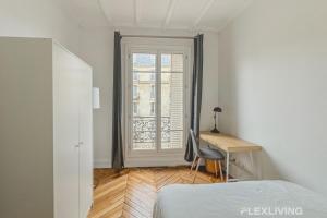 Spacious 4-Bedroom Apartment in Alésia