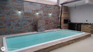 Casa a 300 metros do mar com Piscina