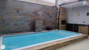 Casa a 300 metros do mar com Piscina