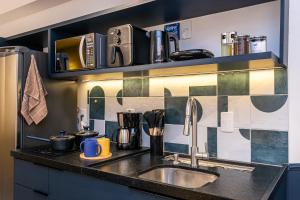 Studio completo a 8 min do metrô no centro do Rio