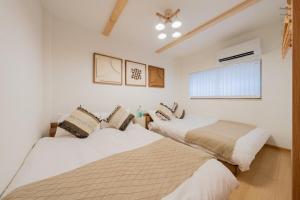 海 大人数にお勧めの一軒家 ベッド11台 お風呂2台 トイレ3台 コリアンタウンや道頓堀近く